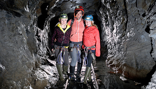 A family exploring underground