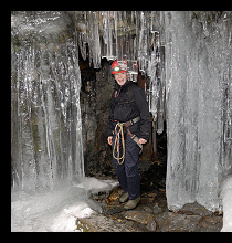 school child entering ice cave grotto