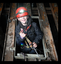 school child on a mine exploration trip